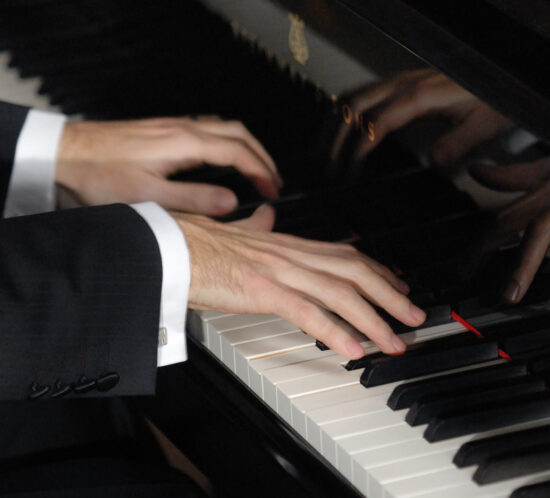 Robin Hutt playing piano keyboard